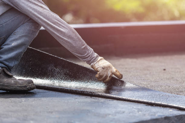 Professional Basement Waterproofing technician working in Flora, IN
